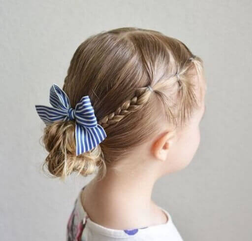 Center Parted Hairstyle With Fine Braids And Casual Bun