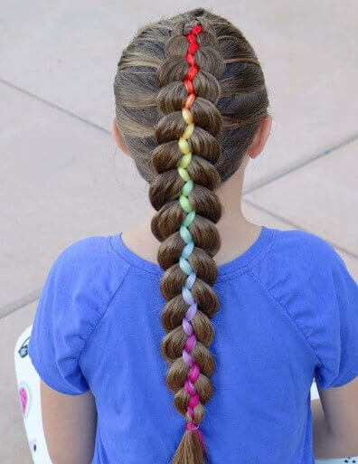 Combed Back Hairstyle With A Thick Braided Ponytail